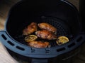 Fried chicken by Air Fryer machine Royalty Free Stock Photo