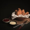 Fried chicken on black dark background