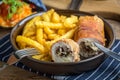 Fried chicken breast stuffed with mushrooms and cheese wrapped i Royalty Free Stock Photo