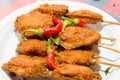 Fried chicken coated with flour.