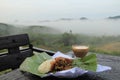 Fried chicken with coffee and mountain View in the morning