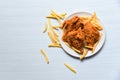 Fried chicken crispy with french fries in white plate on dining table background top view Royalty Free Stock Photo