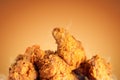 Fried chicken or crispy kentucky on brown background. Delicious hot meal with fast food