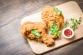 Fried chicken crispy plate wooden board with ketchup on dining table food