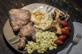 Fried chicken dinner with lima beans, mashed potatoes and tomatoes. Royalty Free Stock Photo