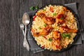 fried chicken drumsticks over rice pilaf, top view Royalty Free Stock Photo