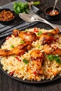 fried chicken drumsticks over rice pilaf, top view Royalty Free Stock Photo