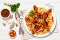 fried chicken drumsticks over rice pilaf, top view Royalty Free Stock Photo