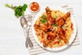 fried chicken drumsticks over rice pilaf, top view Royalty Free Stock Photo