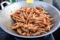 fried chicken feet in a frying pan and mixed with chili Royalty Free Stock Photo