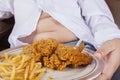 Fried chicken with french fries and potbelly Royalty Free Stock Photo