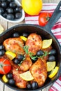 Fried chicken. Fried chicken legs with lemon and olives Royalty Free Stock Photo