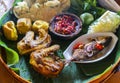 Fried chicken, fried salted fish, and fresh vegetables are traditional dishes typical of the Sundanese, West Java.