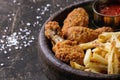 Fried chicken legs with french fries Royalty Free Stock Photo