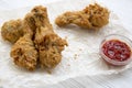 Fried chicken legs with ketchup , side view. Royalty Free Stock Photo