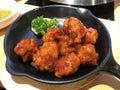 Fried chicken mixed with Korean style sauce.