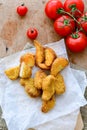 Fried chicken nuggets and wedges potatoes