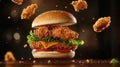 A fried chicken sandwich ingredients with bread bun jumping in the air Royalty Free Stock Photo
