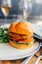 fried chicken sandwich at outdoor restaurant Royalty Free Stock Photo