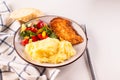 Fried chicken steak or schnitzel with mashed potatoes and vegetables salad in plate Royalty Free Stock Photo