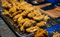 Fried chicken at a street food stall at the weekend market, Phuket, Thailand Royalty Free Stock Photo
