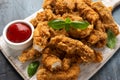 Fried Chicken strips with ketchup on white wooden board. Fast Food Royalty Free Stock Photo