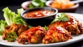 fried chicken thighs with sauce on a white background, the plate fits into a frame with free space