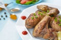 Fried chicken wing, leg and tomato sauce close up Royalty Free Stock Photo