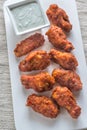 Fried chicken wings with blue cheese sauce Royalty Free Stock Photo