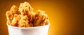 Fried Chicken wings. Bucket full of crispy kentucky fried chicken Royalty Free Stock Photo