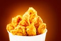 Fried Chicken wings. Bucket full of crispy kentucky fried chicken Royalty Free Stock Photo