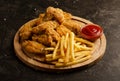 Fried chicken wings, french fries and ketchup sauce Royalty Free Stock Photo