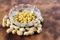 Fried chickpeas and groundnuts on a wooden table