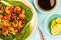 Fried Chinese Style Chilli Prawns On A Bed Of Steamed Pak Choi G Royalty Free Stock Photo