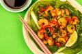 Fried Chinese Style Chilli Prawns On A Bed Of Steamed Pak Choi G Royalty Free Stock Photo