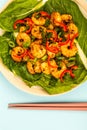 Fried Chinese Style Chilli Prawns On A Bed Of Steamed Pak Choi G Royalty Free Stock Photo