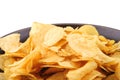 Fried chips on dish over white Royalty Free Stock Photo