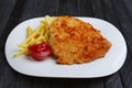 Fried chop pork cutlet with potato and ketchup Royalty Free Stock Photo