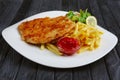 Fried chop pork cutlet with potato and ketchup Royalty Free Stock Photo