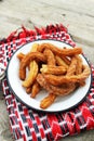 Fried churros with cinnamom sugar and chocolate sauce