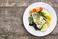 Fried cod fillet and salad Royalty Free Stock Photo