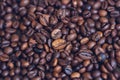 Fried coffee beans background. Macro Vintage toning