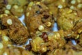 Fried cook of Batate Vade, Batate Vadey, Fried Dhal Beans Cake or Kuih Vadey closeup. Indian traditional food