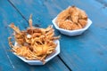 Fried crabs on blue table Royalty Free Stock Photo