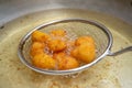 Fried cream Ascolana called crema fritta all`Ascolana cooking in boiling oil is a traditional dish of Ascoli Piceno area in March