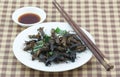 Fried cricket on white dish Royalty Free Stock Photo