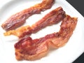 Fried crispy bacon strips Royalty Free Stock Photo