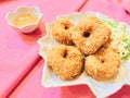 Fried crispy chicken nuggets with chicken sauce and fresh vegetable in white plate Royalty Free Stock Photo