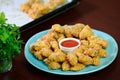 Fried crispy chicken nuggets with ketchup in a plate. Royalty Free Stock Photo