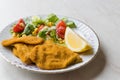 Fried Crispy Sardine Fish Plate with Salad and Lemon / Seafood Sardalya. Royalty Free Stock Photo